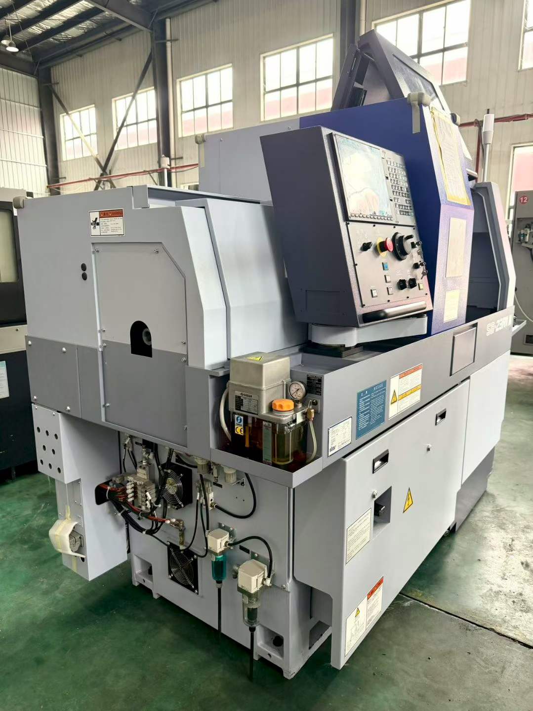 New Star SB-23 RII M 5-Axis Swiss-Type CNC Lathe with Mitsubishi M 80 photo 2