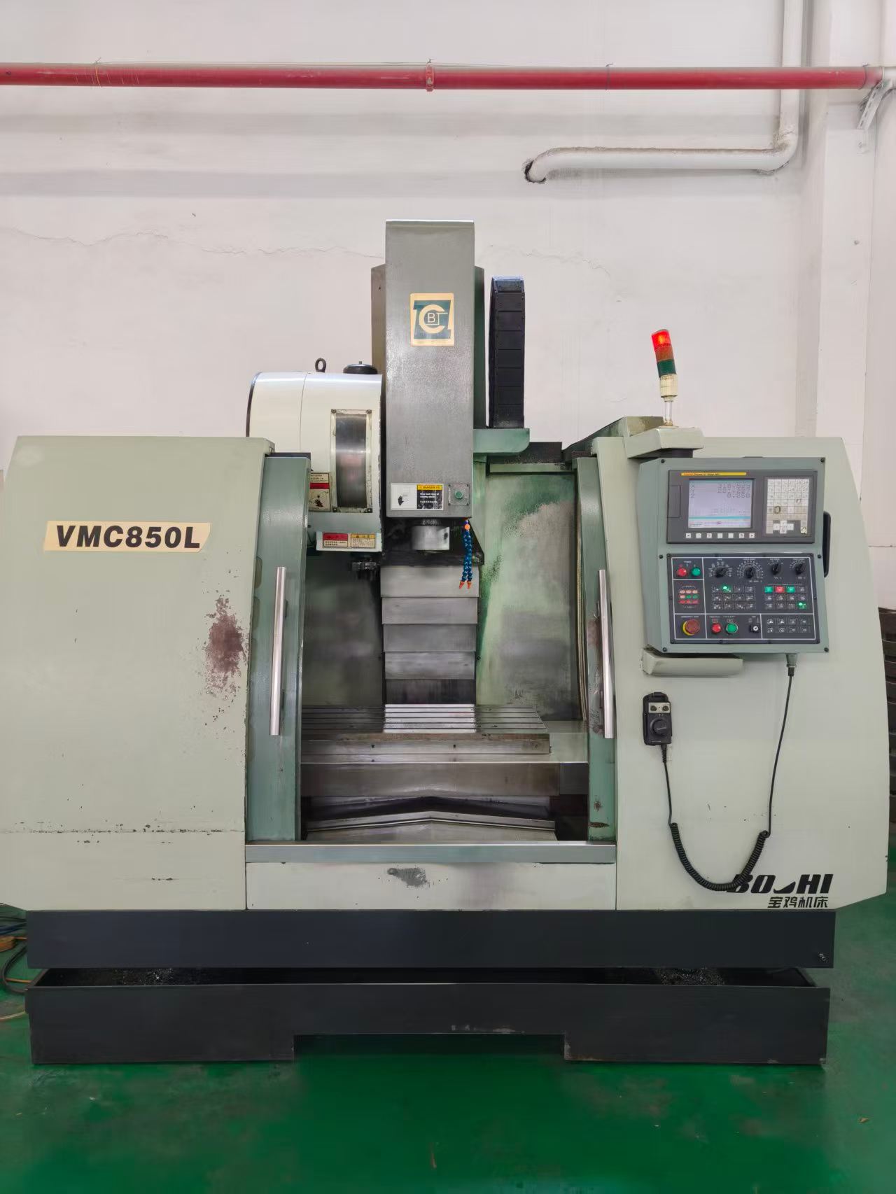 Used Baoji 850 Vertical Machining Center with Fanuc MD Control photo 1