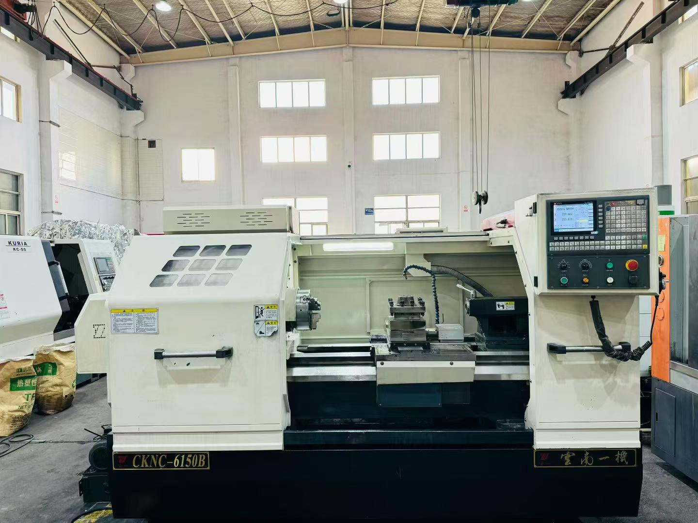 Used Yunnan Yiji 6150 B/1000 CNC Lathe with Hydraulic Chuck photo 2