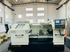 Used Yunnan Yiji 6150 B/1000 CNC Lathe with Hydraulic Chuck photo 2