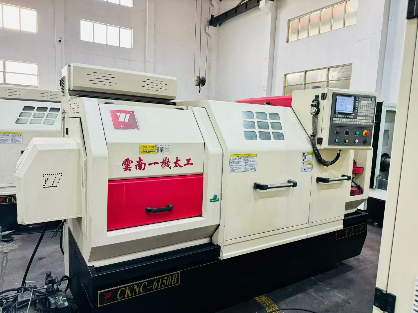 Used Yunnan Yiji 6150 B/1000 CNC Lathe with Hydraulic Chuck photo 3