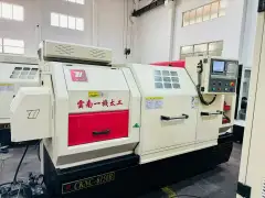 Used Yunnan Yiji 6150 B/1000 CNC Lathe with Hydraulic Chuck photo 3