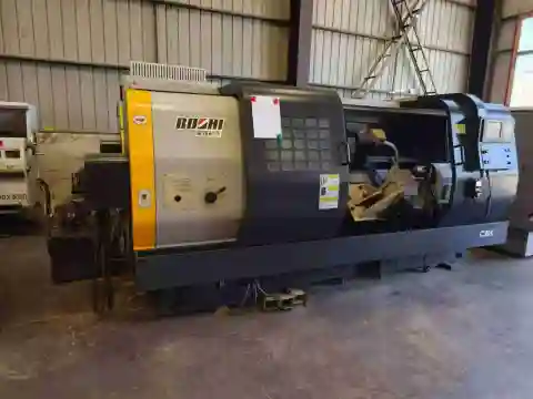 Torno CNC de cama inclinada Baoji CBK 63/2000 con control FANUC - 3 unidades disponibles