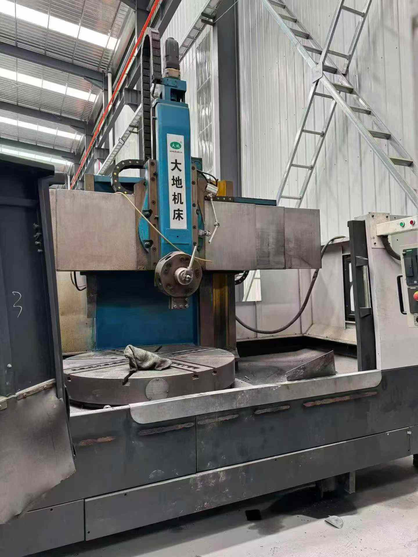 Dalian New World 5116 CNC Vertical Lathe with Siemens 828 D photo 1