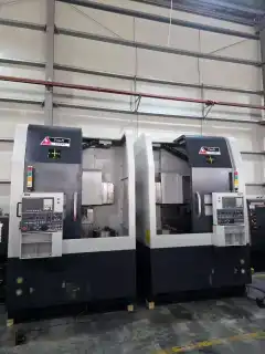 Two Identical You Ji 500 E CNC Vertical Lathes photo 1