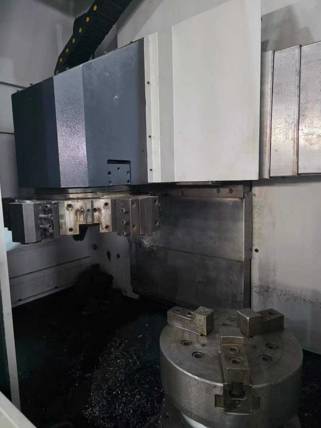 Two Identical You Ji 500 E CNC Vertical Lathes photo 3