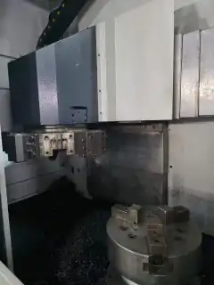 Two Identical You Ji 500 E CNC Vertical Lathes photo 3