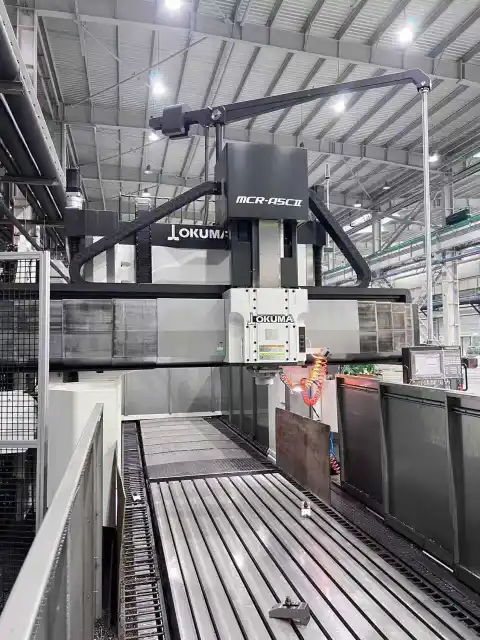 Máquina fresadora de pórtico Okuma MCR-A 5 Cll 20 x 40 usada