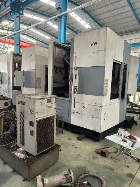 Bubut Vertikal CNC Shenyang V 6 C Bekas dengan Kontrol FANUC