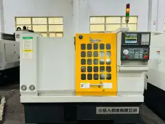 Used Xiaotieren QT 320 Turret-Type CNC Lathe with 6-Inch Hydraulic Chuck photo 2