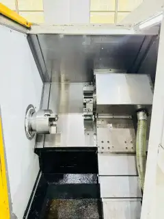 Used Xiaotieren QT 320 Turret-Type CNC Lathe with 6-Inch Hydraulic Chuck photo 3
