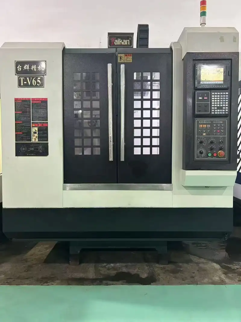 Used Taiqun V 650 Machining Center with Mitsubishi M 70 photo 1