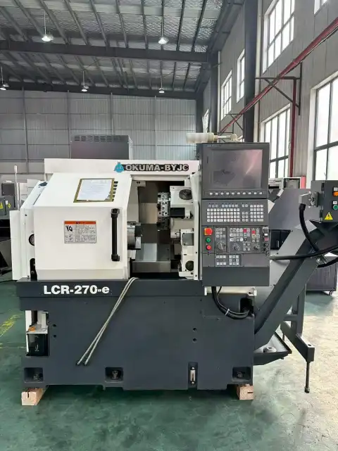 Torno CNC Okuma LCR-270-e usado con Okuma OSP-P300LA-e