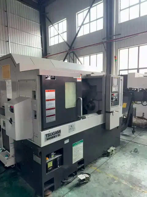 Torno CNC de torneado y fresado de doble husillo Tsugami M 08 SY usado