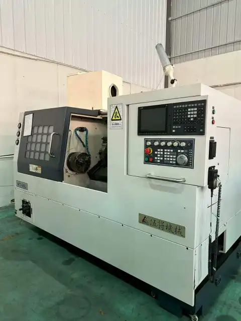 Mesin Bubut CNC Bekas Wu Jiang VT-18 L dengan Kontrol Mitsubishi M80