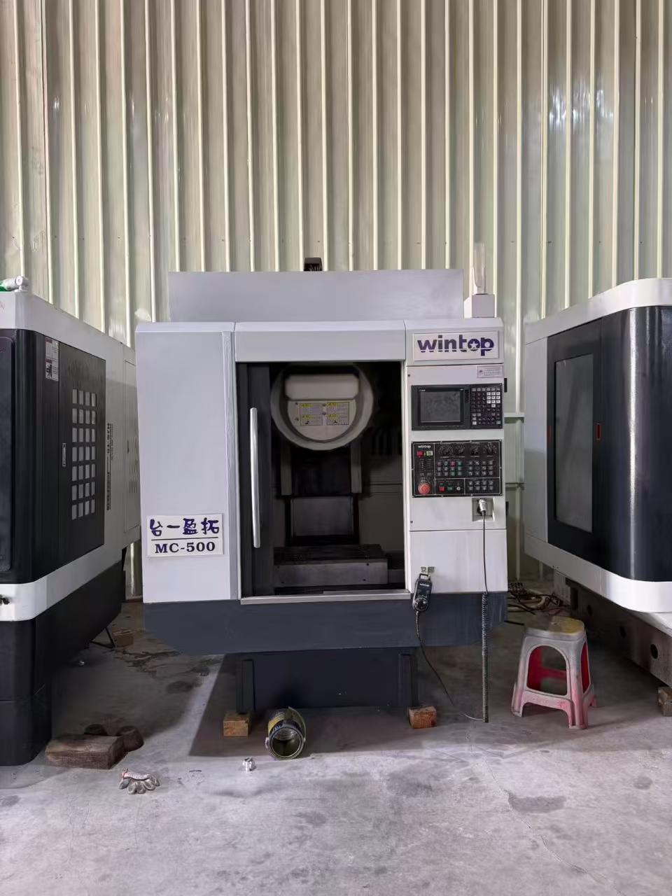 Used Tair T 500 Vertical Machining Center with Mitsubishi M 80 photo 1