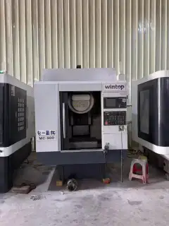 Used Tair T 500 Vertical Machining Center with Mitsubishi M 80 photo 1
