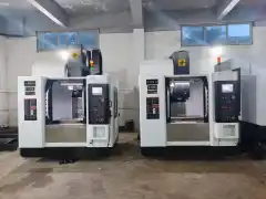 Two Taiwan Takumi Vertical Machining Centers (850 L and T-V 850) with Mitsubishi Control photo 1