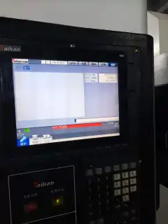 Two Taiwan Takumi Vertical Machining Centers (850 L and T-V 850) with Mitsubishi Control photo 8
