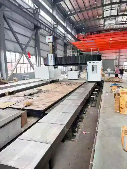 Neway Fresadora de pórtico 4 m x 12 m, Control FANUC Plus, Almacén de herramientas vertical/horizontal