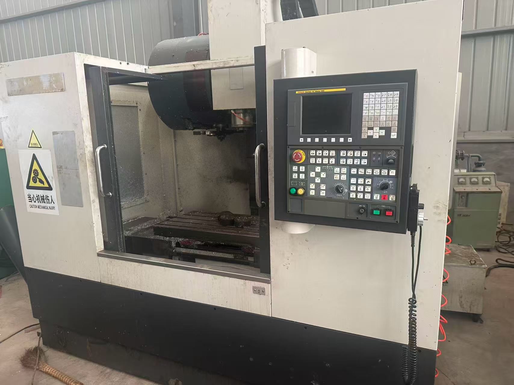 Used Vertical Machining Center 850 with Fanuc MD Control photo 1