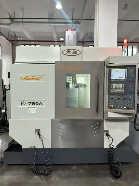 Trung tâm gia công đứng CHAMPMILL e-750 A đã qua sử dụng với FANUC 0i-MF cần bán