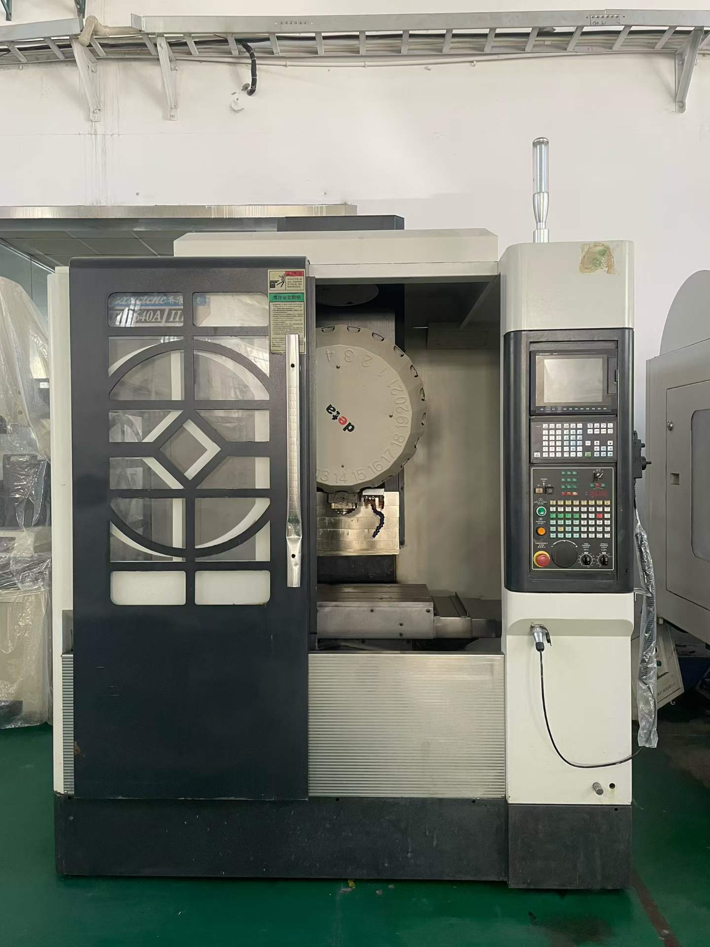 Used Qizhun 604 and Dongtai 710 Vertical Machining Centers photo 2