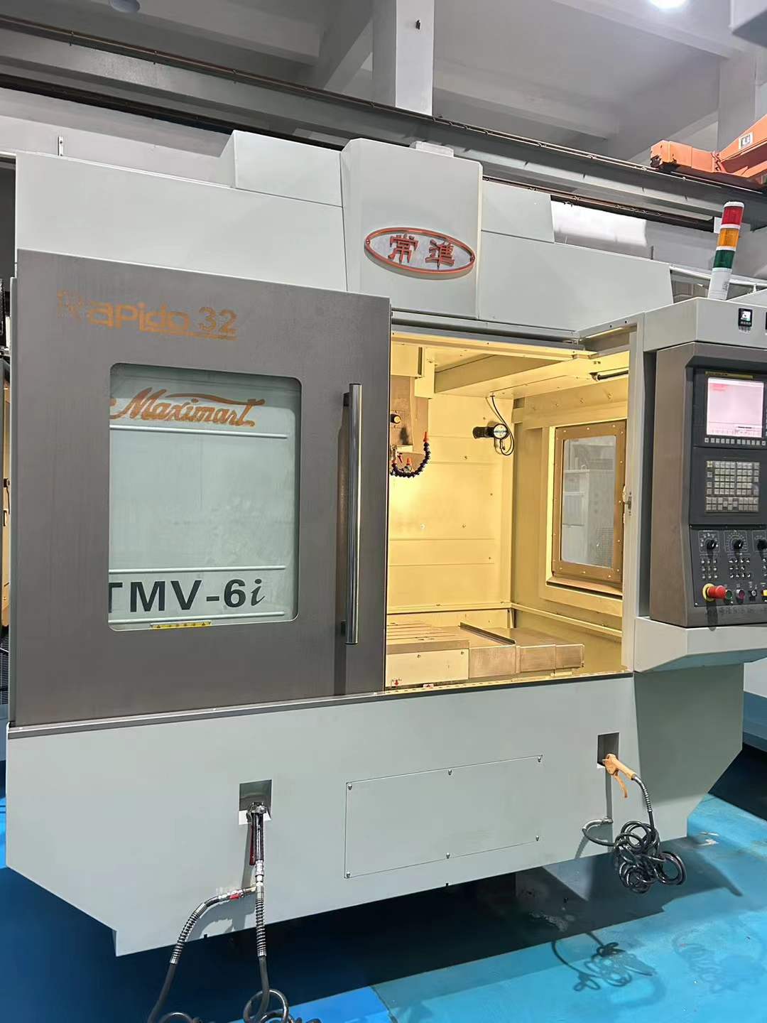 Used CHAMPMILL TMV-6i High-Speed Vertical Machining Center with FANUC MF Control photo 2