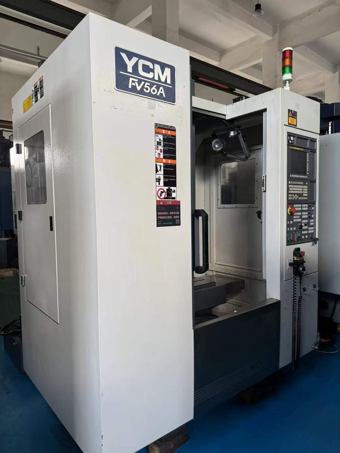 Used YCM FV 56 A & CV 56 A Vertical Machining Centers with FANUC Controls photo 1