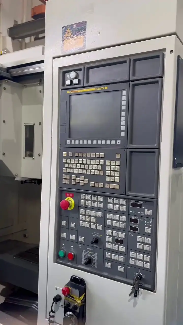 Used YCM FV 56 A Vertical Machining Center with FANUC MXP-200 FB photo 1