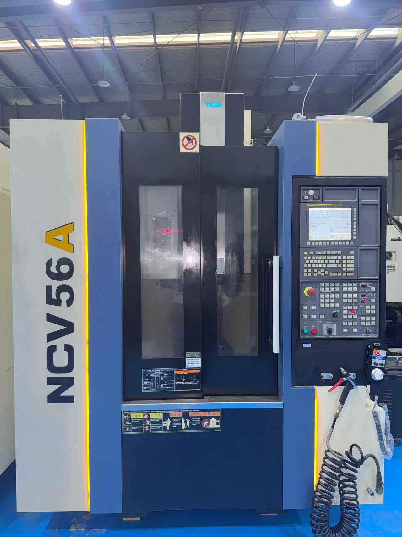 Used YCM NCV 56 A Vertical Machining Center with Fanuc MXP 200 FA Controller photo 2