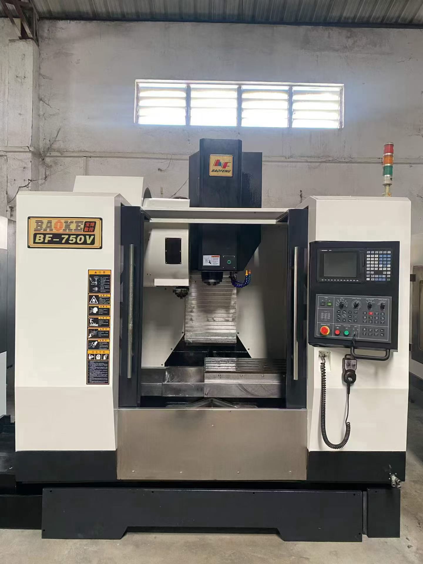 Used Baofeng 750 V Vertical Machining Center with Mitsubishi M 70 photo 1