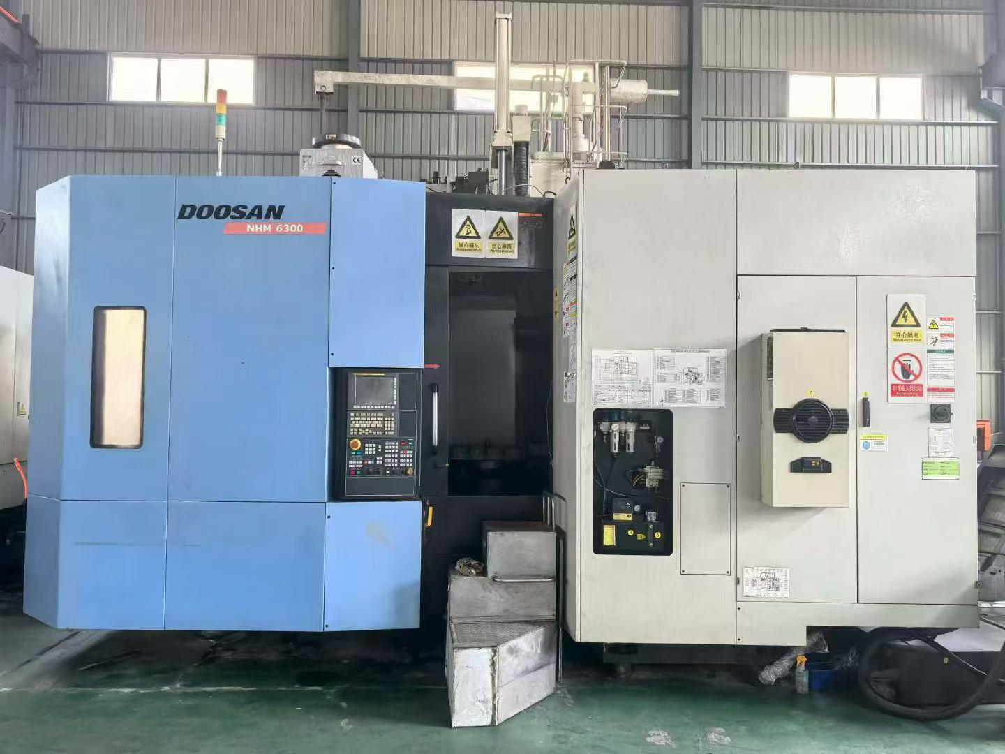 Б/у горизонтальный обрабатывающий центр тяжелого класса Doosan NHM 6300