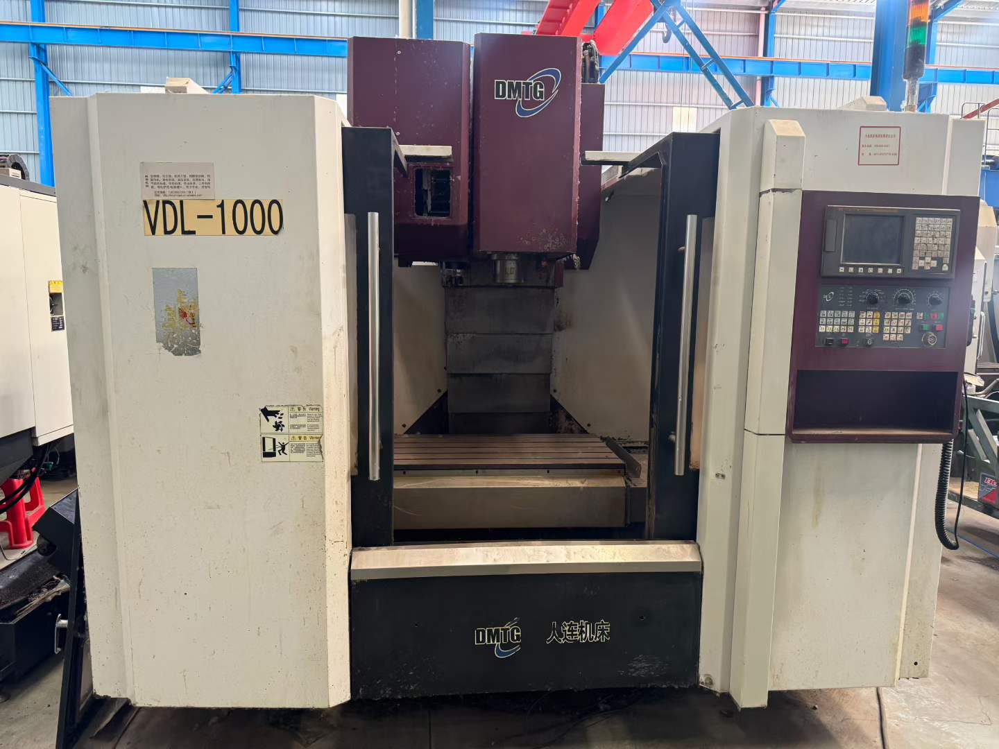 ศูนย์เครื่องจักรกล Dalian 1000 มือสองพร้อม FANUC