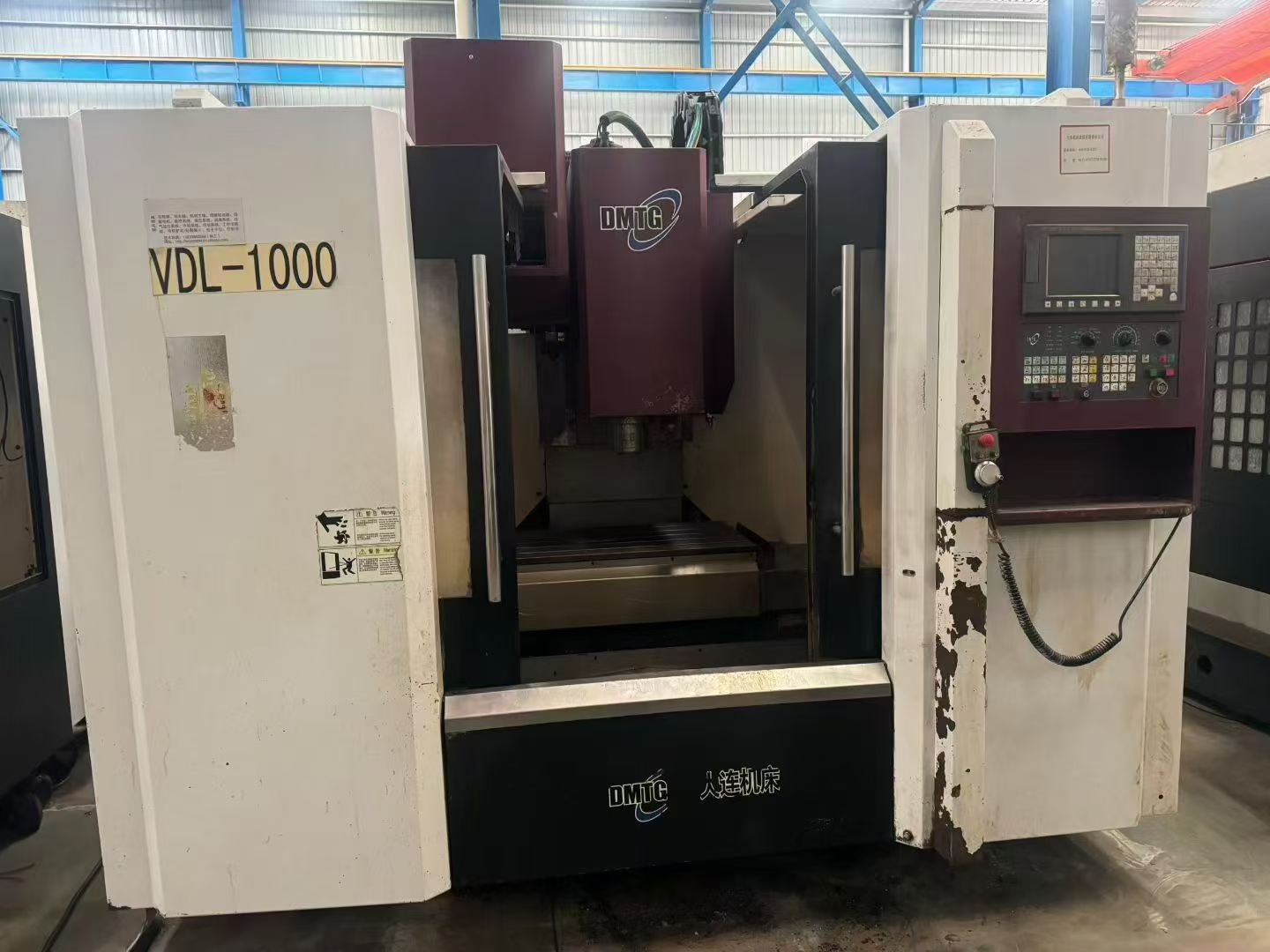 Used Dalian 1000 Machining Center with Fanuc MD photo 1