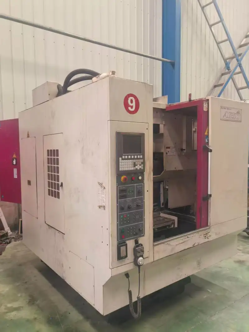 Used Jieli 650 Vertical Machining Center with Fanuc MD photo 1