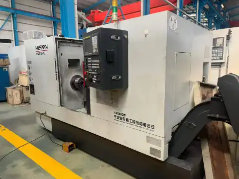 Torno CNC de bancada inclinada Haitian TC25MC usado