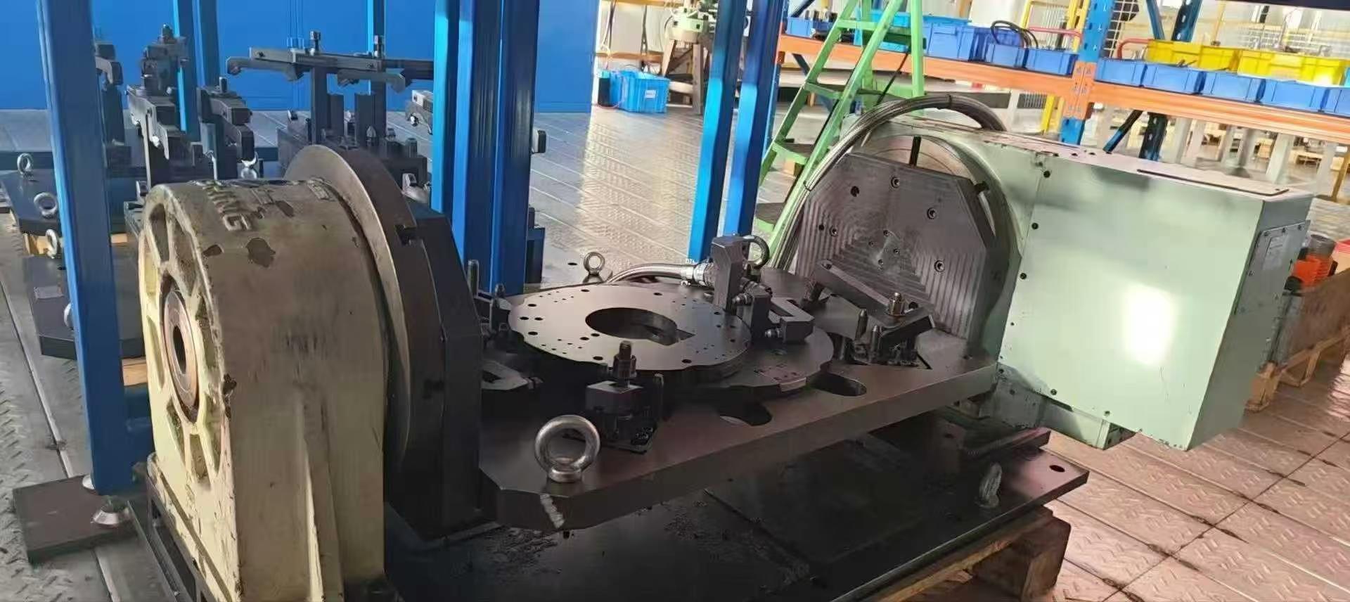 Used Tan Hsing 400 Four-Axis with Tailstock and Rocker Plate photo 2