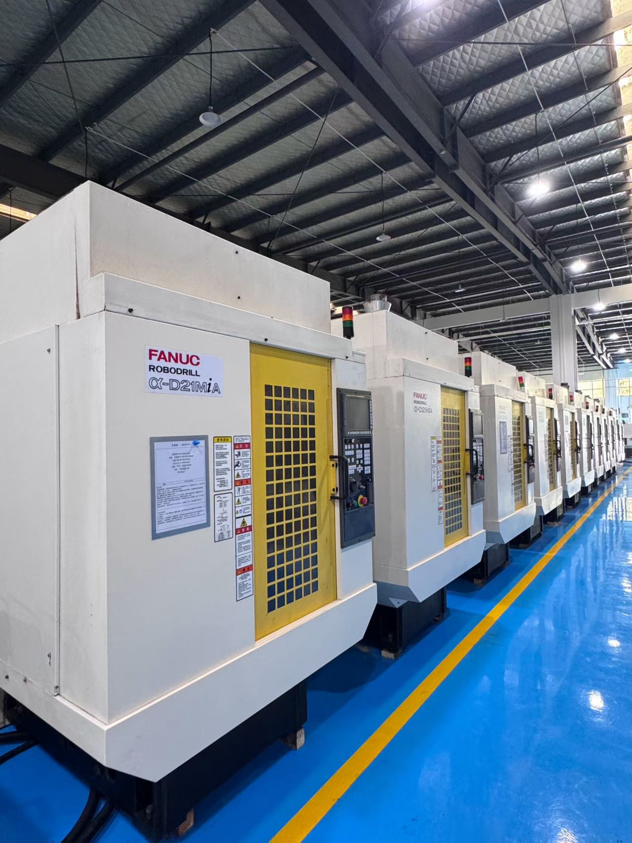 Centro de taladrado y roscado Fanuc D 21 MiA usado con control Fanuc 31 i-B