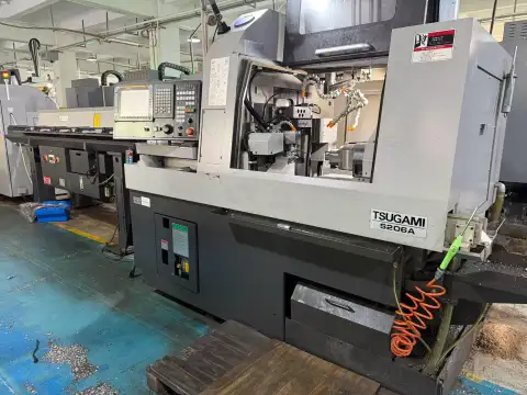 Torno CNC Suizo Usado Tsugami S 206 A con Control FANUC TF Plus
