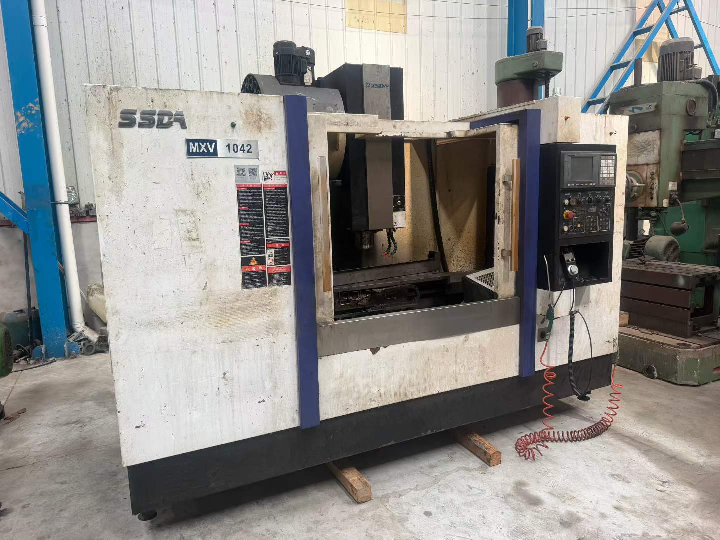 Used Xinsida 1042 Machining Center photo 1