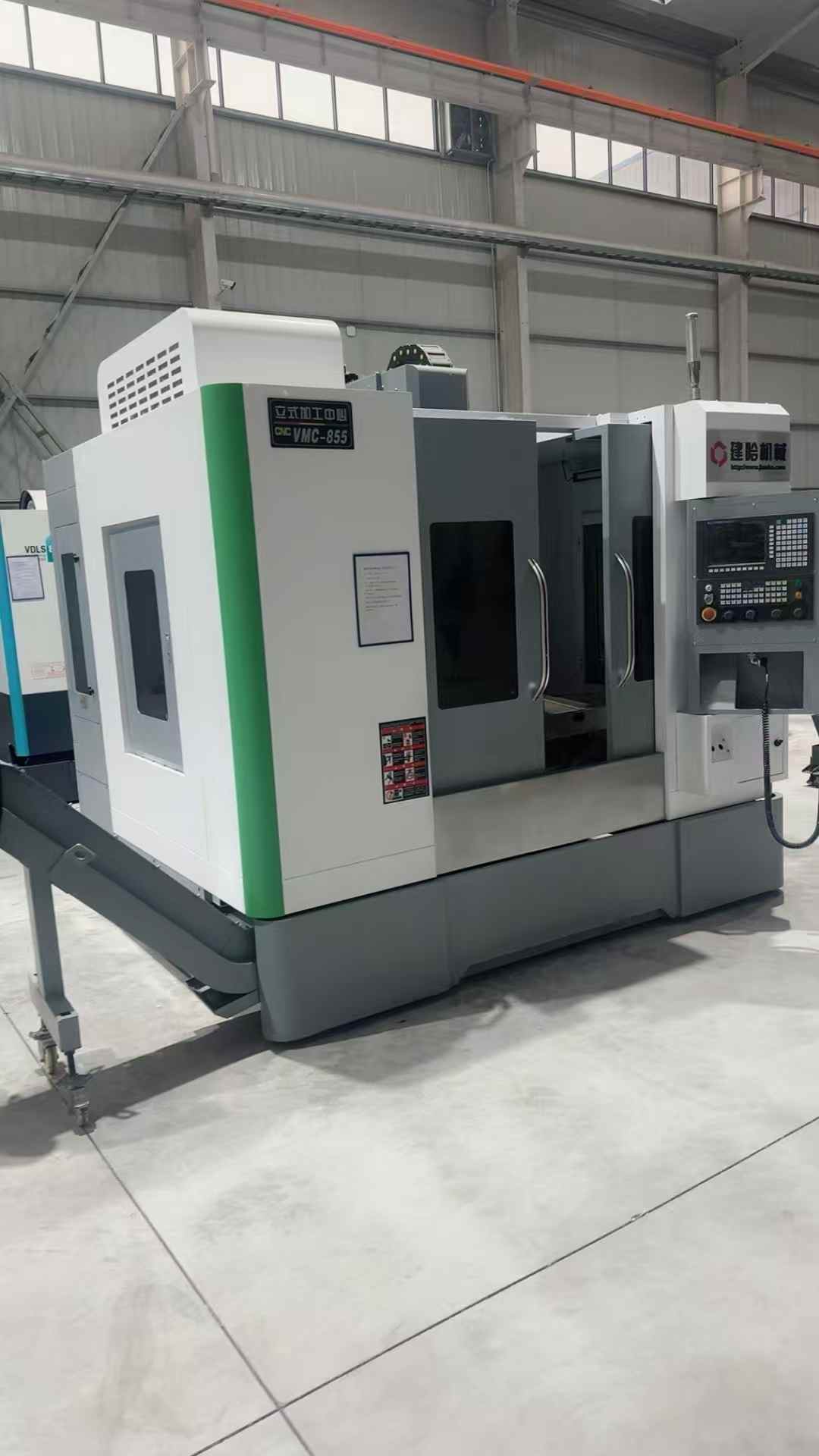 Used 855 Vertical Machining Center with Chip Conveyor photo 1