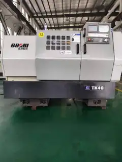 Used Baoji TK 40 CNC Lathe photo 1