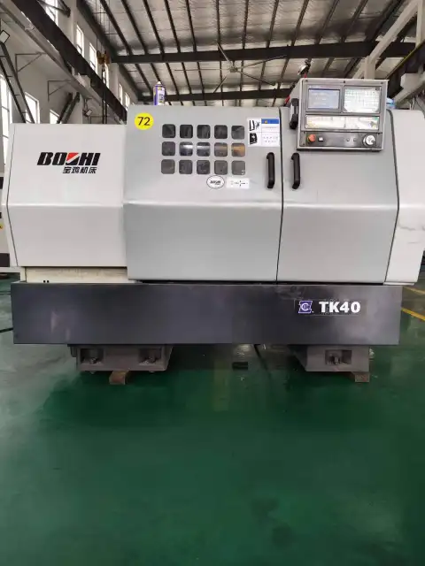 Torno CNC Baoji TK 40 usado