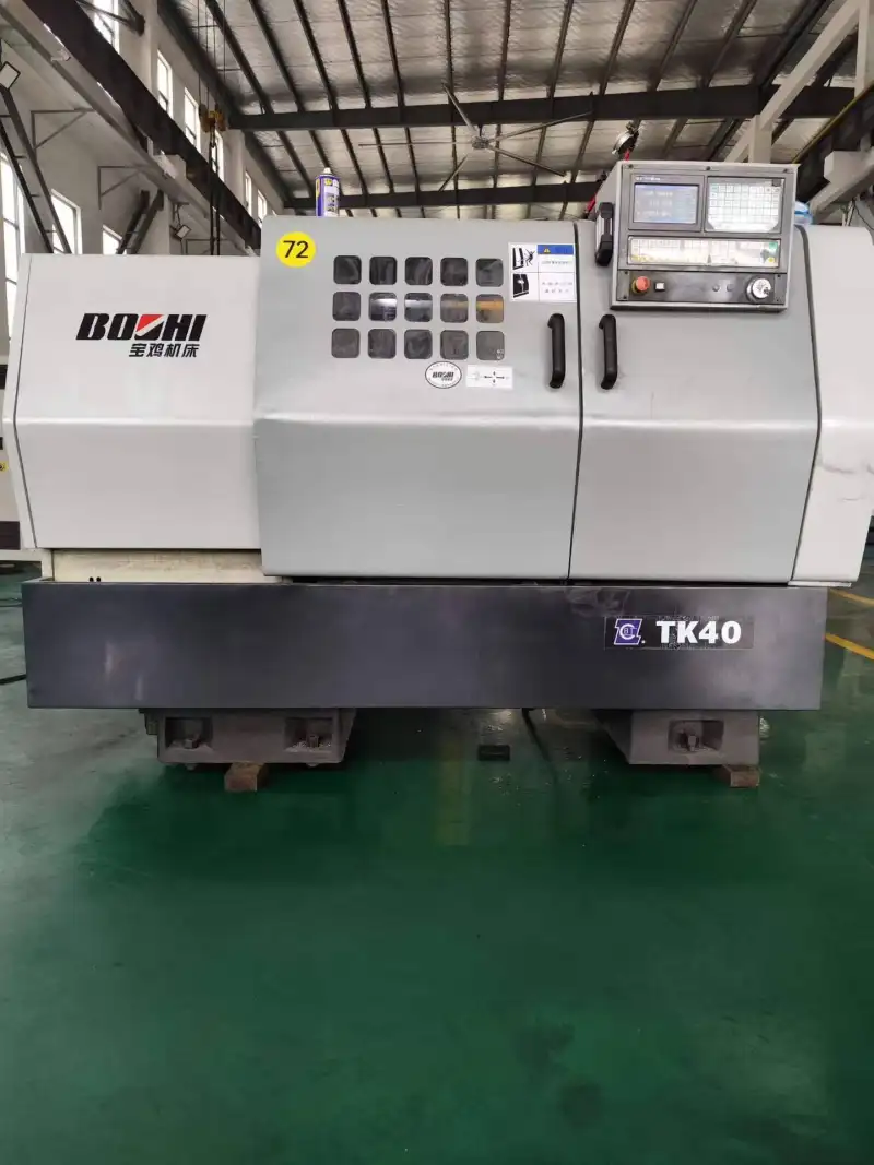 Used Baoji TK 40 CNC Lathe photo 1