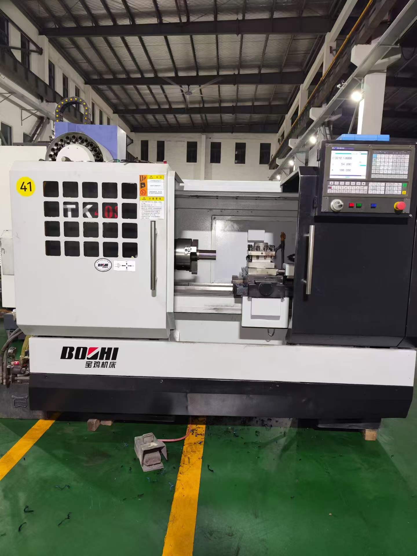 Used Baoji TK 40 S CNC Lathe with GSK 980 TDc photo 1