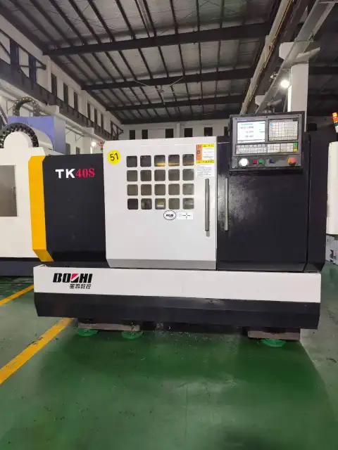 Torno CNC Baoji TK 40 s usado con control GSK 980 TDc