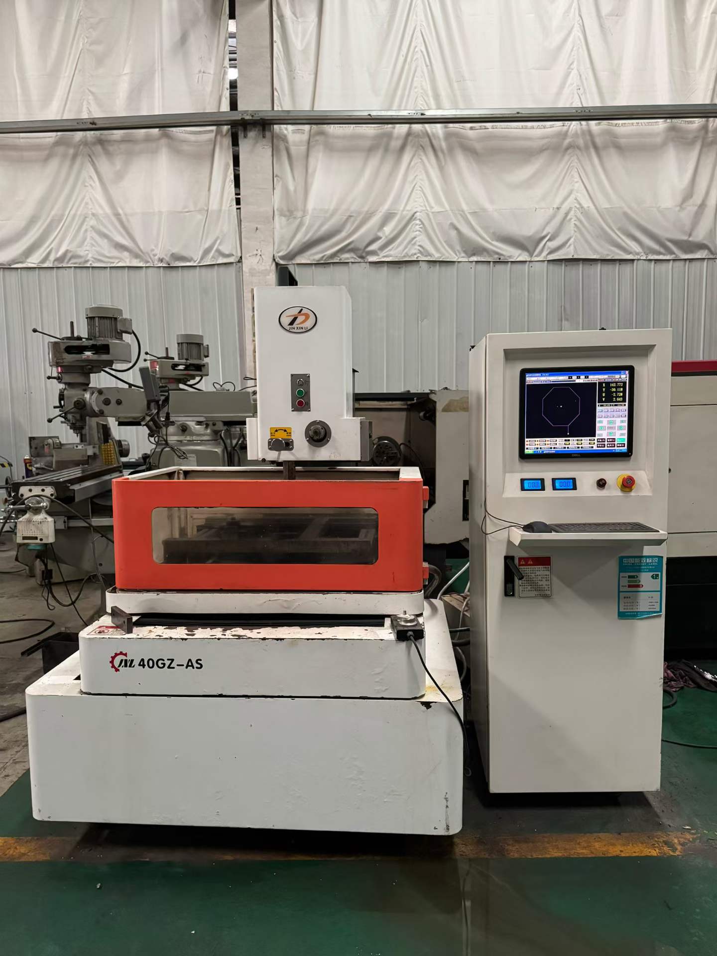 Máquina de electroerosión por hilo de media velocidad Ningbo Hengwei 40 usada en venta