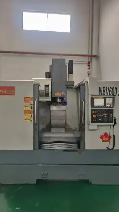 Used Nanjing Best 650 Vertical Machining Center with FANUC MD photo 1