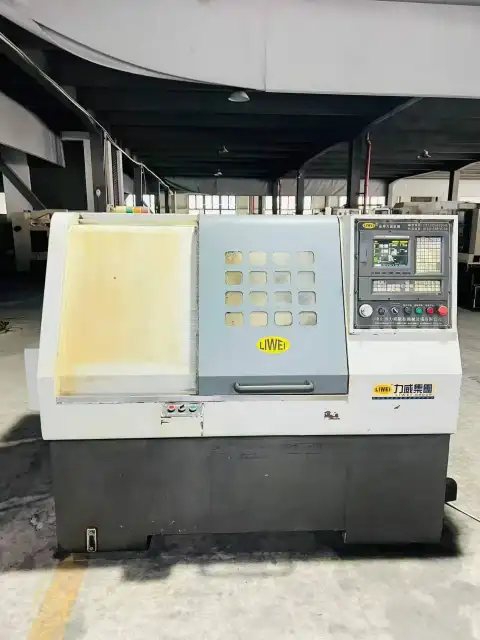 Torno CNC de bancada inclinada tipo ganga usado de 46